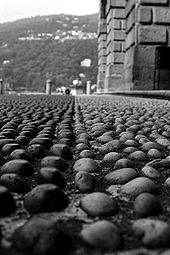 Italian cobblestone-covered street in Isola Bella. Cobblestones such as these are designed for horses to get a good grip. ItalianStones.jpg