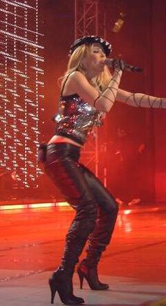 Minogue performing "Love at First Sight", the closing song of the event