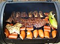 Barbecue Grill "Laredo Style" Fajita center, Chicken left, Ribs above, Sausage bottom, Corn right