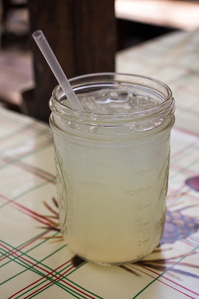 Glass of cloudy homemade lemonade, typical in North America, France and South Asia
