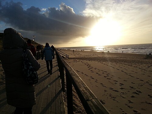 Sylt, Germany: People go on a pedestrian bridge