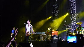 Often compared to Maroon 5 (pictured), CNBLUE set out to form its own musical identity Maroon 5 Live in Hong Kong 33.jpg