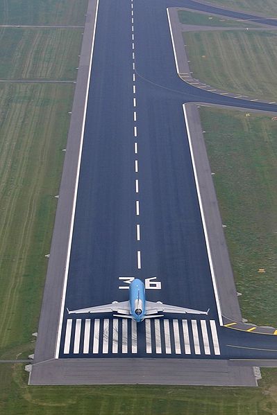 An MD-11 at one end of a runway