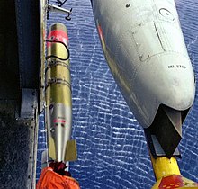 Torpille Mk46 et détecteur d'anomalie magnétique sur un SH-3 Sea King.