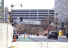 Union Station street viewed from the nearby NoMa neighborhood of Washington D.C. in January 2021 with a Red Line train in the distance Monday afternoon, 18 January 2021 Walk from WMATA NoMa Station to Senate Park - Washington DC IMG 7930a (50851483362).jpg