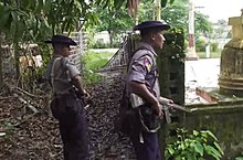Members of the Myanmar Police Force patrolling in Maungdaw in September 2017. Myanmar police patrolling in Maungdaw.jpg