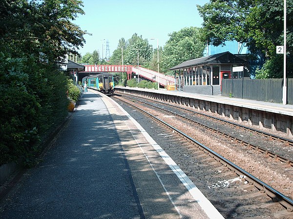 Eastbound service with 156498 at New Pudsey in June 2006