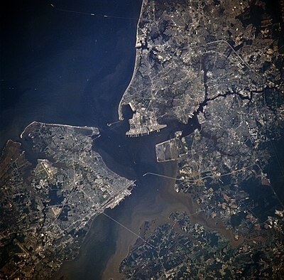 Newport News, Hampton, Isle of Wight County, Suffolk, Chesapeake, Portsmouth and Norfolk, from space, July 1996. Norfolk is located in the upper-right quadrant; east is at the top.