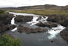 Norðurá river with waterfall Glanni