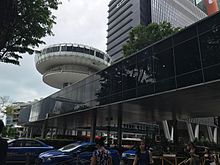 OUE Link, newly revamped Change Alley Aerial Plaza in the background OUE link and Revolving Tower 2.jpg