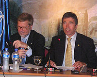 Danish foreign minister Per Stig Moller (left) and Danish prime minister Anders Fogh Rasmussen (right) at the summit. Per Stig Moller Anders Fogh Rasmussen Istanbul NATO Summit 2004.jpg
