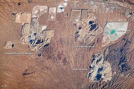 Astronaut photo of the open-pit copper mines adjacent to Green Valley, 2010. Note that north is to the left.