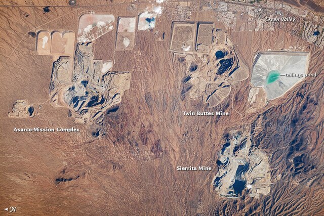 Astronaut photo of the open-pit copper mines adjacent to Green Valley, 2010. North is to the left.