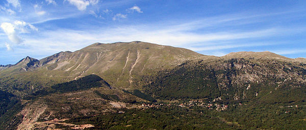 Pindus in Epirus - The village of Anthochori resting beneath the east face of Kalogiros peak, Lakmos Mountain.