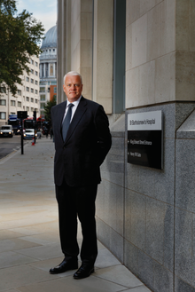 Knight stood outside St Bartholomew's Hospital