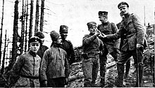 Russian troops meeting German troops in No Man's Land RJB23 - Friede 1917 1.jpg