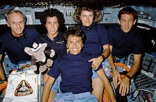 The five STS-34 astronauts pose for an in-space crew portrait.