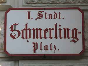 Schmerlingplatz: Geschichte, Lage und Charakteristik, Bauwerke