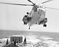 SH-3G over the frigate USS Bagley