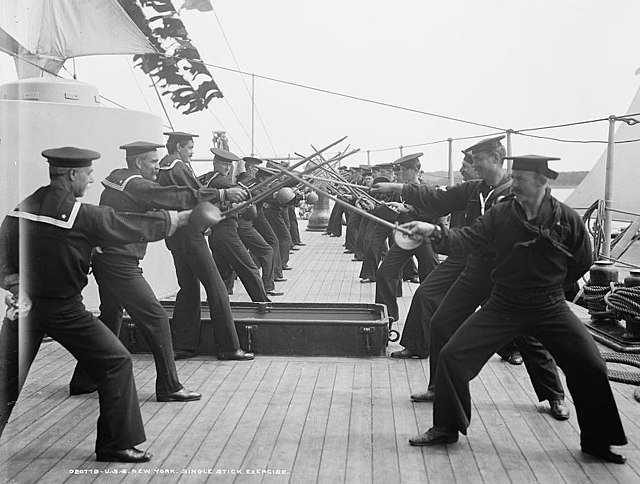 U.S. sailors practice with the singlestick