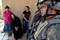Soldiers, National Police Search Homes, Meet With Residents Despite Heat DVIDS52407.jpg