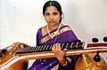 Saraswati veena, the calabash resonator not always functional but keeps its place because of the balancing function.[೩]