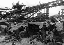Soviet soldiers in the Red October Factory Stalingrad - ruined city.jpg