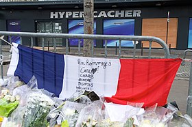 The French Tricolored Flag is on Display Outside the Hyper Cacher Kosher Market (16291418132).jpg