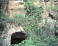 Toccia[25] ruins, arched door on the tuff spur, area of the archaic Votive Well, Ponte del Peccato, valley of the Aia stream, Grappignano Poggio Sommavilla.[26][27]