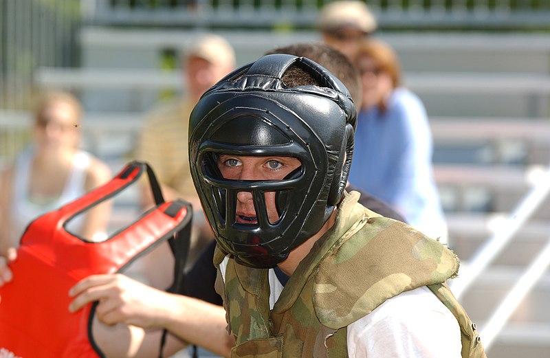 File:US Navy 070515-N-1134L-004 A plebe, or midshipman 4th class, sizes up his opponent during the pugil-stick event during Sea Trials at the U.S. Naval Academy.jpg