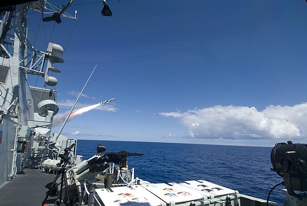 HMCS Regina fires a Harpoon missile