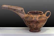 Long-neck Vasiliki ware "teapot", with characteristic mottled decoration. Vassiliki ware with long neck archmus Heraklion.jpg