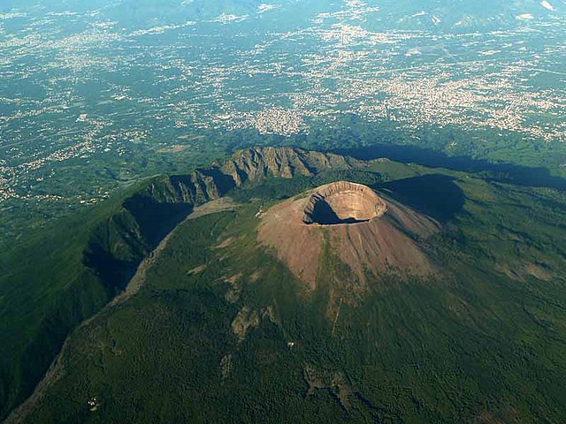 The main cone of Vesuvius and the cliff of Monte Somma's caldera separated by the valley of Atrio di Cavallo