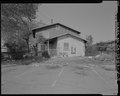 View of east elevation of Building No. 23. Parking Area No. 25 in foreground. Looking west-northwest - Easter Hill Village, Building No. 23, North side of South Twenty-sixth Street, HABS CA-2783-P-5.tif
