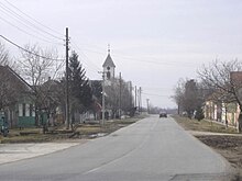 Vilovo, main street and the Orthodox Church.jpg