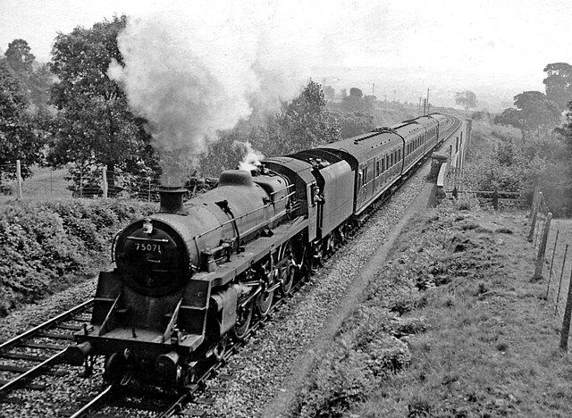 Northbound Somerset & Dorset train climbing up from Shepton Mallet at Windsor Hill in 1959