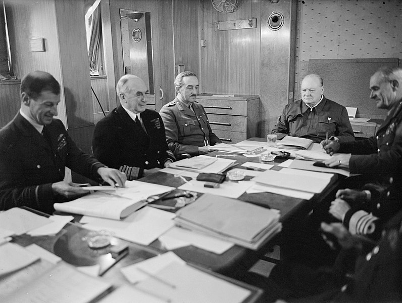 File:Winston Churchill and his Chiefs of Staff around a conference table aboard SS QUEEN MARY en route to the USA, May 1943. A16709.jpg