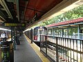 An R142 4 train on Track 1,...