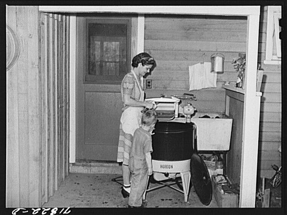 File:Woodville, California. FSA (Farm Security Administration) farm workers' community. Wife and son of an agricultural worker who live in a garden house LCCN2017817404.tif