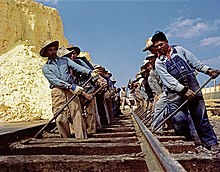 Workers adjusting railroad tracks, Louisiana, ca. 1939 Workers Adjusting Railroad Tracks, Texas Gulf Sulphur Company.jpg