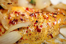 Smoked Haddock served with onions and red peppers