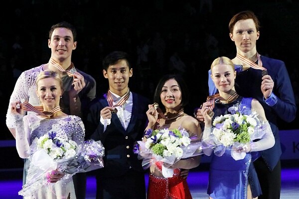 Tarasova and Morozov at the 2017 World Championships podium.