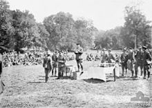 The Australian commander, Monash, presenting decorations to members of the 4th Brigade after the battle 4 bde (E02758).jpg