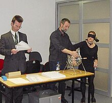 The Australian Electoral Commission holding a blind ballot to determine the order of candidates on the ballot paper Ac.ballotdraw.jpg