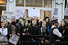 Protesters wearing Guy Fawkes masks from the V for Vendetta film, at February 10, 2008 protest in London Anon London Feb10 TCR Protesters.jpg