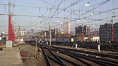 Brussels-South, overhead wires suspended across multiple tracks.