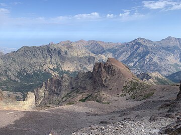 Capu Borba and a remote view of Calvi and mountain Monte Grosso