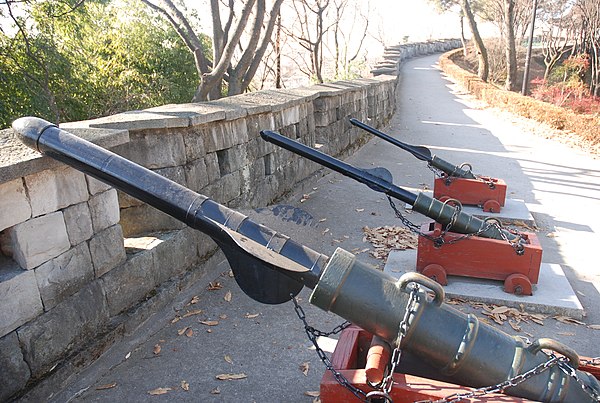 Three large Chongtong at the Jinju Fortress museum. The closest is a cheonja-chongtong, the second is a jija-chongtong, and the third is a hyeonja-cho