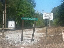 A railroad identification sign for Constitution in DeKalb County Constitution, DeKalb County, Georgia.JPG
