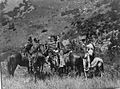 Crow men trading on horseback- Edward S. Curtis.jpg